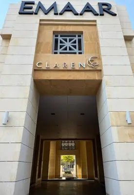 a building with a sign on top of it at Elite Downtown 1BR Stylish 1BR in Dubai