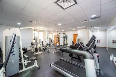 a gym with treadmills and elliptical machines at Marcopolo - Relaxing 1BR in Dubai Marina with Huge Balcony in Dubai
