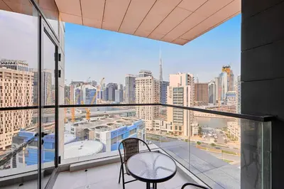 a balcony with a view of a city skyline at Bright 1 BHK in Prime Location in Dubai
