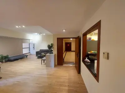 a living room with a couch and a table at Dubai Short Stay Vacation Homes Rental Room in Dubai