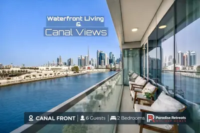 a view of a river from the balcony of a building at Serene Waterfront Gem UPSCALE in Dubai