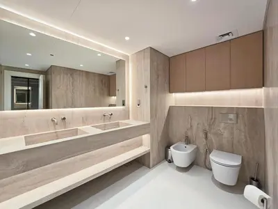 a bathroom with a tub and a toilet and a sink at Marina Residence 5, Palm Jumeirah - Mint Stay in Dubai