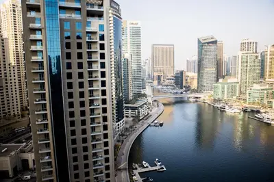 a view of a river in a city with buildings at Dubai Marina Penthouse Suite - Prime Location in Dubai