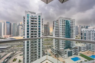 a view of a city skyline with tall buildings at Marina Canal View Apartment, Walking Distance to The Metro and Tram, Near The Beach and Top Dining - Bayside Residence, Dubai Marina by Deluxe Holiday Homes in Dubai
