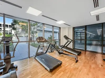 an image of a gym with cardio equipment at Upscale City Walk 3BR plus Maid Near Dubai Mall in Dubai