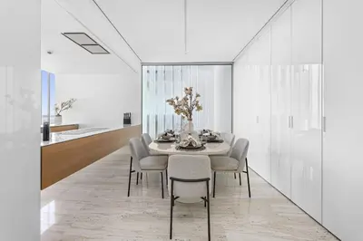 a dining room with a table and chairs at VayK - Ultra Luxury Muraba Residences in Palm in Dubai