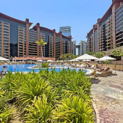 VayK - Spacious 2BR with Private Gym & Beach Access