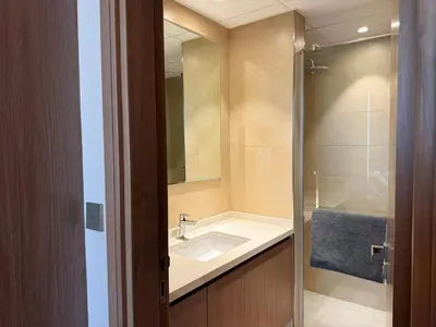 a bathroom with a sink and a shower at Spacious 1BR- Sepcoo III Residence Al Furjan-1009 in Dubai