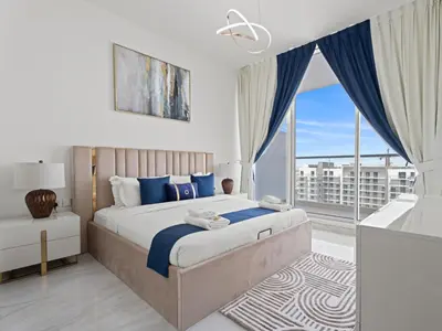 a bedroom with a large bed and a large window at Velvet Luxe Modern - 1BR w Private Pool in Gemz-15 in Dubai