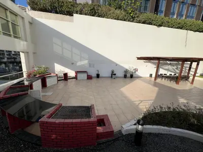 a courtyard in a building with a pavilion at Signature Prestige 1BR Sleeps 4 -Damac Central in Dubai