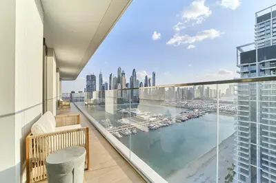 a balcony with a view of the city at Luxury 3BR Marina View at Palace Beach Residence in Dubai