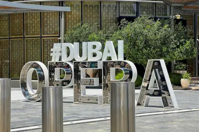 a large sign in front of a building at Silk Valley - Luxury 2BR in Downtown near Burj Khalifa & Dubai Mall in Dubai