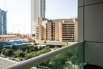 a view of a city from the balcony of a building at Royal oceanic in Dubai