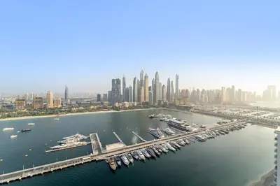 an aerial view of a harbor with a city at Luxe 2BR with Full Marina Views & Beach Access in Dubai