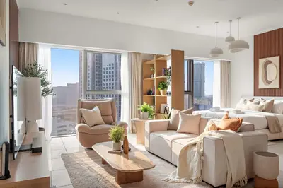 a living room with a bed and a couch at Silkhaus Entrepreneur Work & Stay Studio in DIFC in Dubai