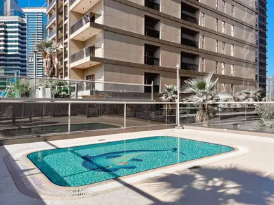 a swimming pool on the side of a building at Elite Downtown Residence, Downtown Dubai - Onelink in Dubai