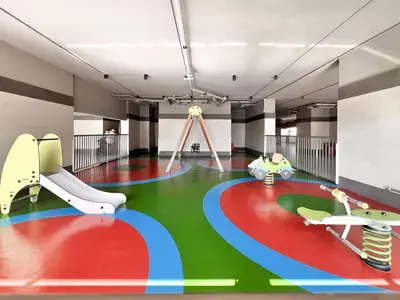 a childrens play area with a slide and swings at Elite Downtown Residence, Downtown Dubai - Onelink in Dubai