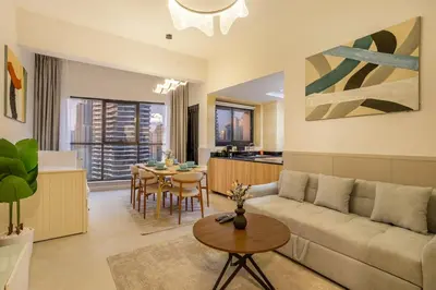 a living room with a couch and a table at Luxury 2BHK in Dubai Marina Escan 2001 in Dubai