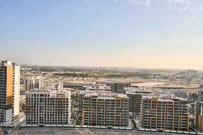 an aerial view of a city with tall buildings at STAY BY LATINEM Luxury 1BR plus study Holiday Home W2405 in Dubai