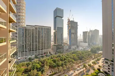 an aerial view of a city with tall buildings at The Fitness Suite JVC - Pool View - Zaya Hameni in Dubai