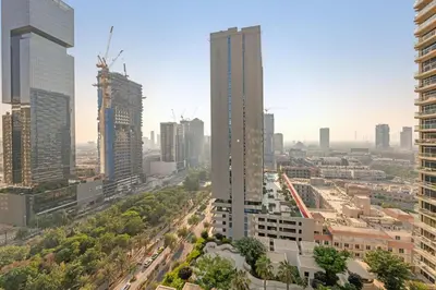 an aerial view of a city with tall buildings at The Fitness Suite JVC - Pool View - Zaya Hameni in Dubai