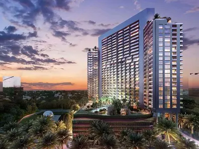 a rendering of a large building with palm trees in front at The Fitness Suite JVC - Pool View - Zaya Hameni in Dubai