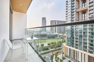 a balcony with a view of a city at STAY BY LATINEM Luxury 2BR Holiday Home G5- 5812 near Burj Khalifa in Dubai