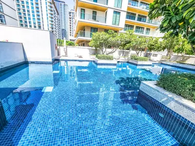 a swimming pool in the middle of a building at STAY BY LATINEM Luxury 2BR Holiday Home G5- 5812 near Burj Khalifa in Dubai