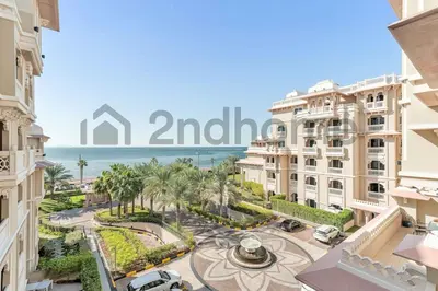 an aerial view of the resort with the ocean at Beachfront Escape Sea-View Balcony Palm Jumeirah in Dubai