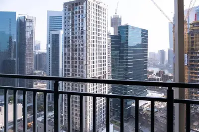 a view of a city skyline from a balcony at Zada Tower, Business Bay - Onelink in Dubai