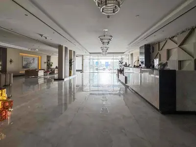 a large room with a lobby with a large lobby at Frank Porter - Hera Tower in Dubai