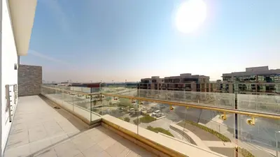 a balcony with a view of a city at Luxury 2br Penthouse Spacious in Dubai