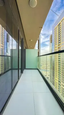 a view from an office building balcony with windows at High floor studio with stunning views in Aykon City in Dubai