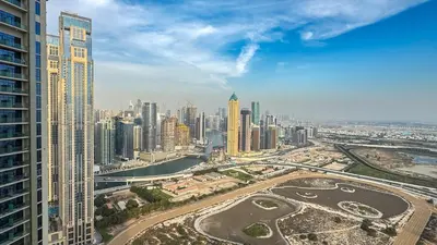 an aerial view of a city with tall buildings at High floor studio with stunning views in Aykon City in Dubai