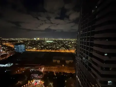 a view of a city at night from a building at Modern 1-BR in Armada Tower 3, JLT, Sky Views in Dubai