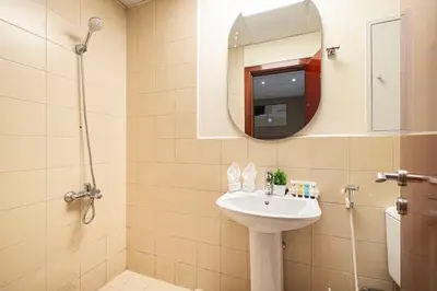 a bathroom with a sink and a mirror at Chic JBR Apartment Beach Walk Dining Nightlife in Dubai