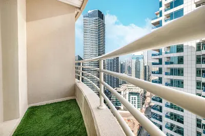 a balcony with a view of a city at Luxury 3BHK with floating bed in Marina in Dubai