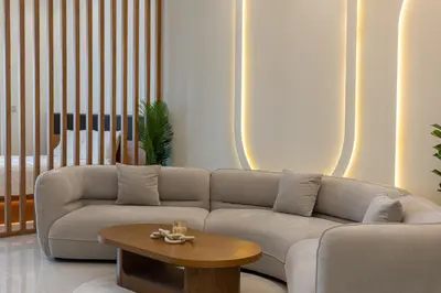 a living room with a couch and a coffee table at Lux 3BHK With Pvt Jacuzzi in Marina in Dubai