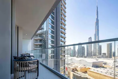 an apartment balcony with a view of a city at Frank Porter - Vida Dubai Mall in Dubai