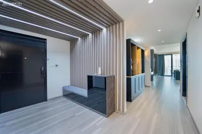 a hallway with a black table in a building at Blvd Point-Full Burj Khalifa View-Downtown in Dubai