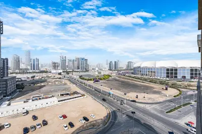an aerial view of a city with tall buildings at Elegant Minimal Studio with Balcony in Dubai