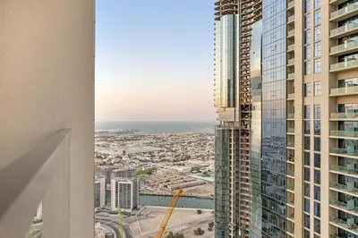 a view of a city from a building at Stylish 2BR Canal Views, High Floor in Dubai