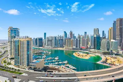 a view of a city with a harbor at Golden Stays - Opulent 2BR View Residence at The Bay in Dubai