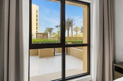 a view from a window in a room at Modern 1BR in Jadeel 2 MJL in Low Floor in Dubai