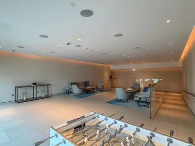 a large room with chairs and a table in it at Timeless Elegance 1BR Address Beach JBR in Dubai