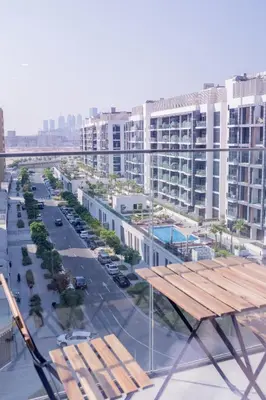 a view of a city with buildings and a parking lot at Snug Modern Downtown Dubai Studio in Dubai