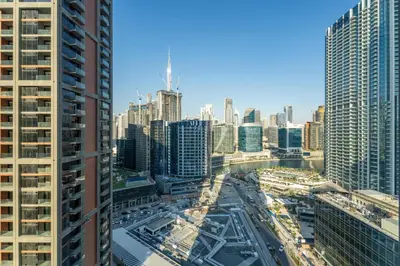 an aerial view of a city with tall buildings at GuestReady - 1BR Luxury | Prime City Area in Dubai