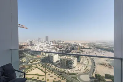 a view of a city from a building at Luxury 1BR - Miracle Garden View - Skyz in Arjan in Dubai