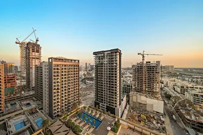 a view of a city with tall buildings at FIRST CLASS Studio Cozy Luxe Retreat in Dubai