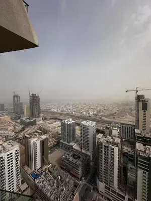 an aerial view of a city with tall buildings at Modern1BR Binghatti Phantom Private pool JVC in Dubai